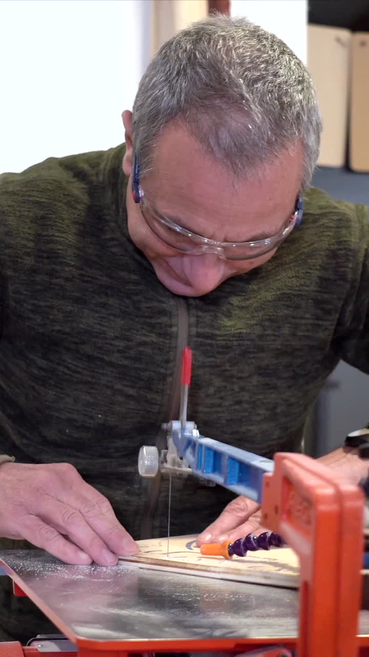 Man using a scroll saw for woodworking