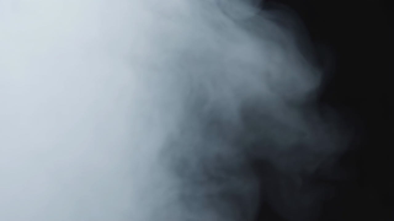 Dense White Smoke Drifting Across Black Background, Soft Billows And Plume Shapes, Slow Cinematic Movement,