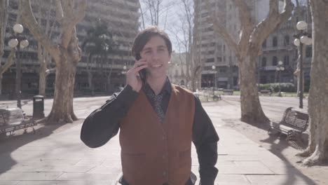 young business man talking on the phone and smile