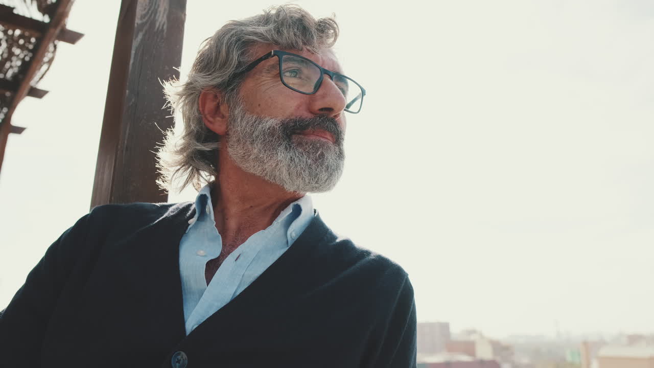 Portrait of a Mature Man with Beard and Glasses