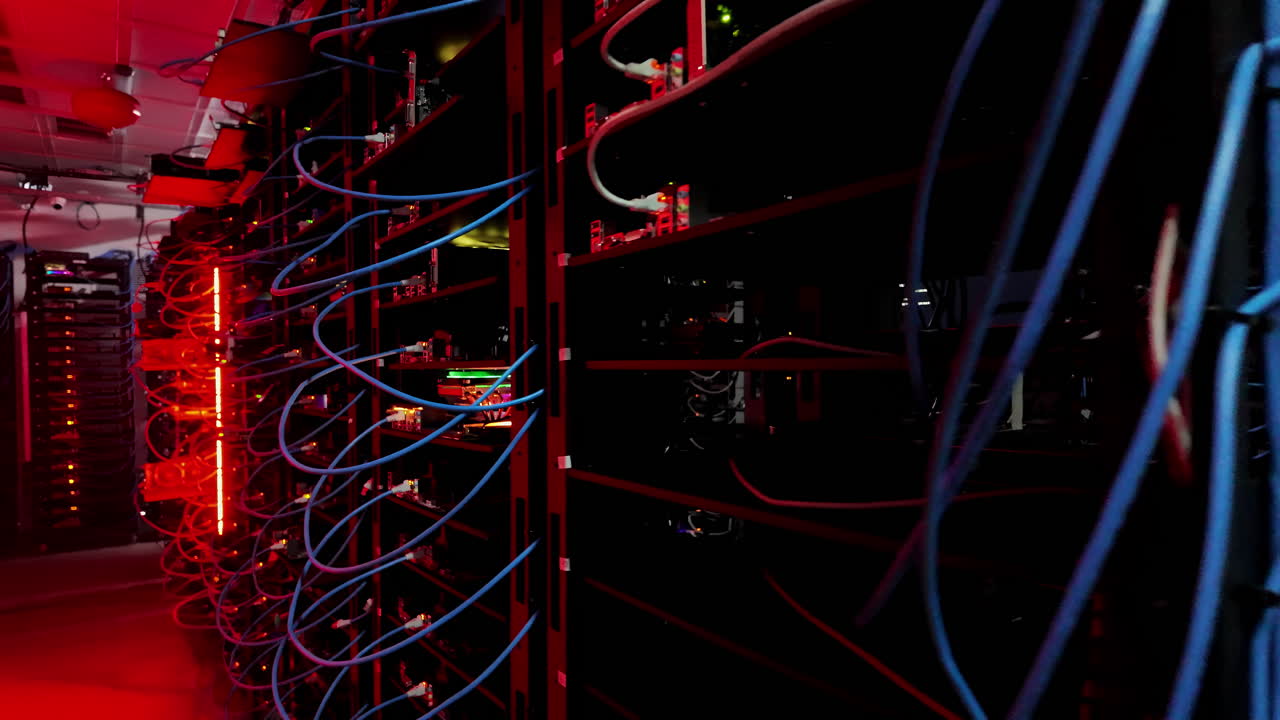 Multiple servers with flashing red lights in a data center