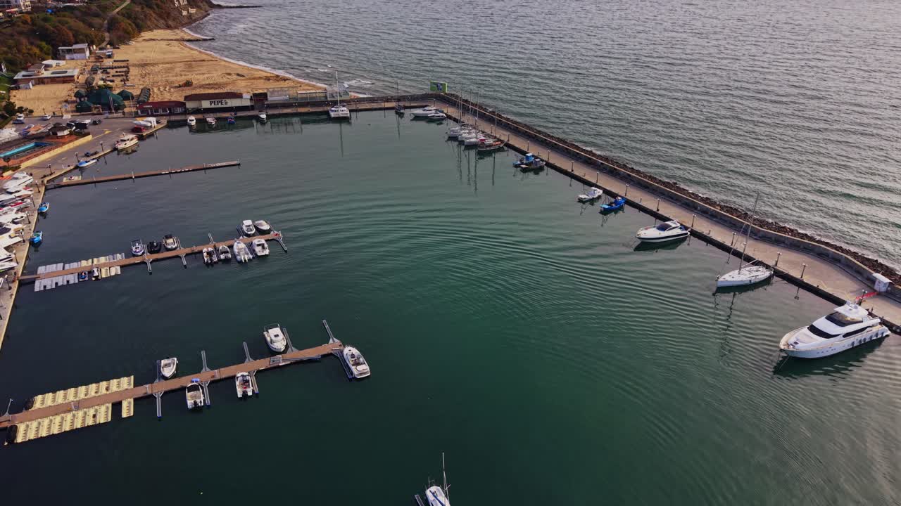 Coastal marina in Bulgaria with boats and serene waters