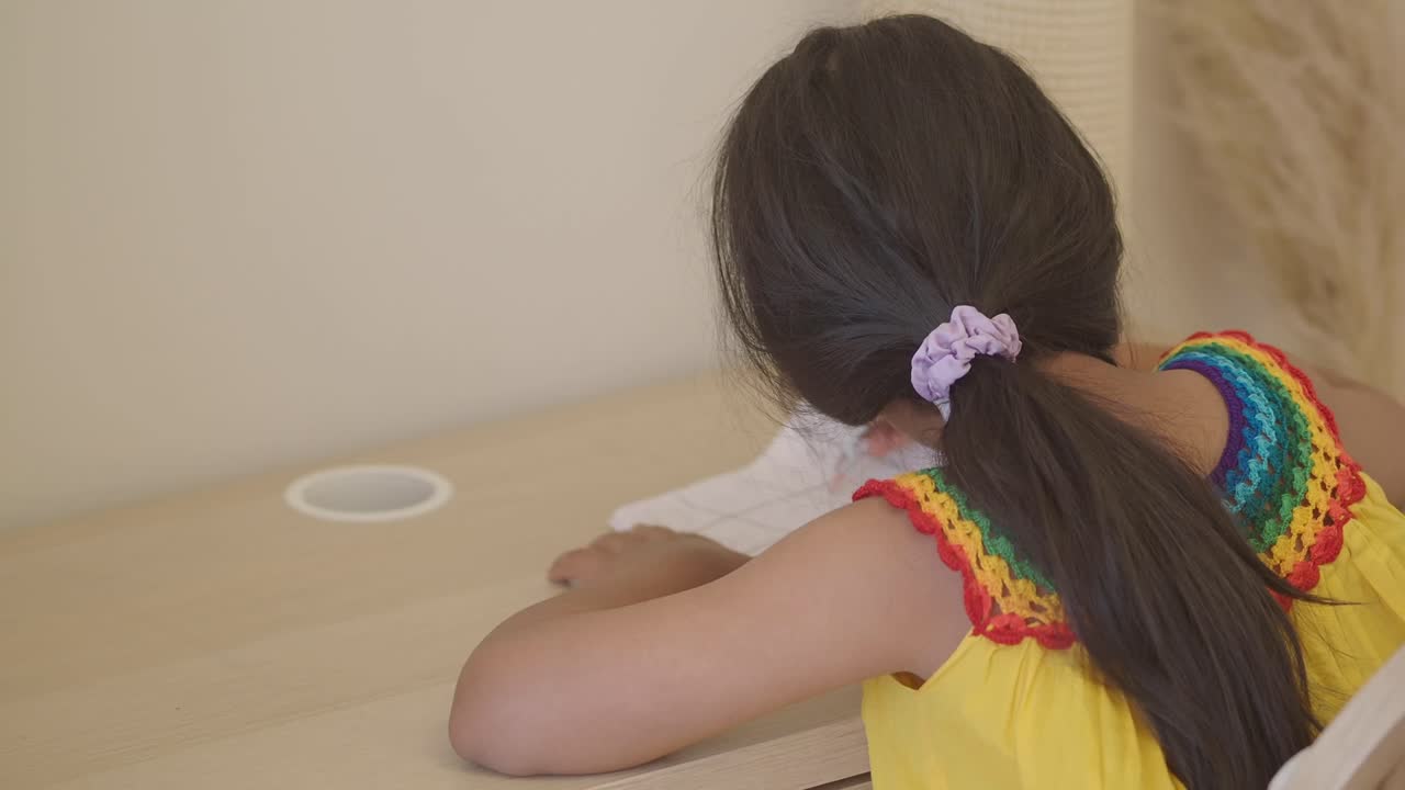 Girl doing homework at desk