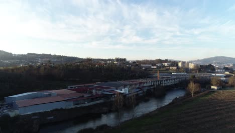 Aerial-View-of-factory-next-to-the-river