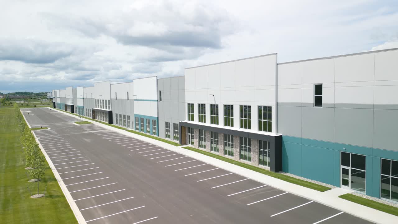 Cinematic Drone Flight Above Modern Warehouse Office Building - Generic USA Location