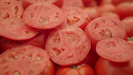 Close-up of Fresh Sliced and Whole Red Tomatoes