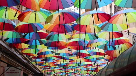 beautiful multicolored rainbow umbrellas hanging over canopy