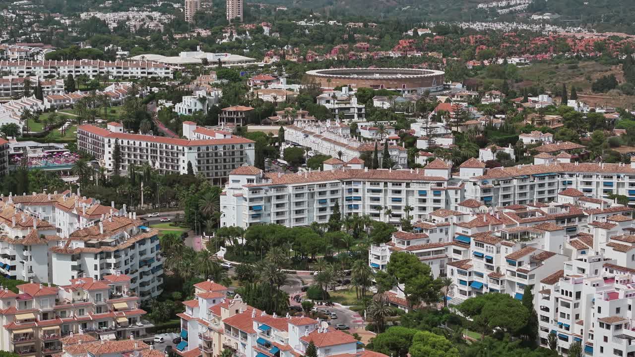 Aerial view of Marbella's urban landscape with lush greenery