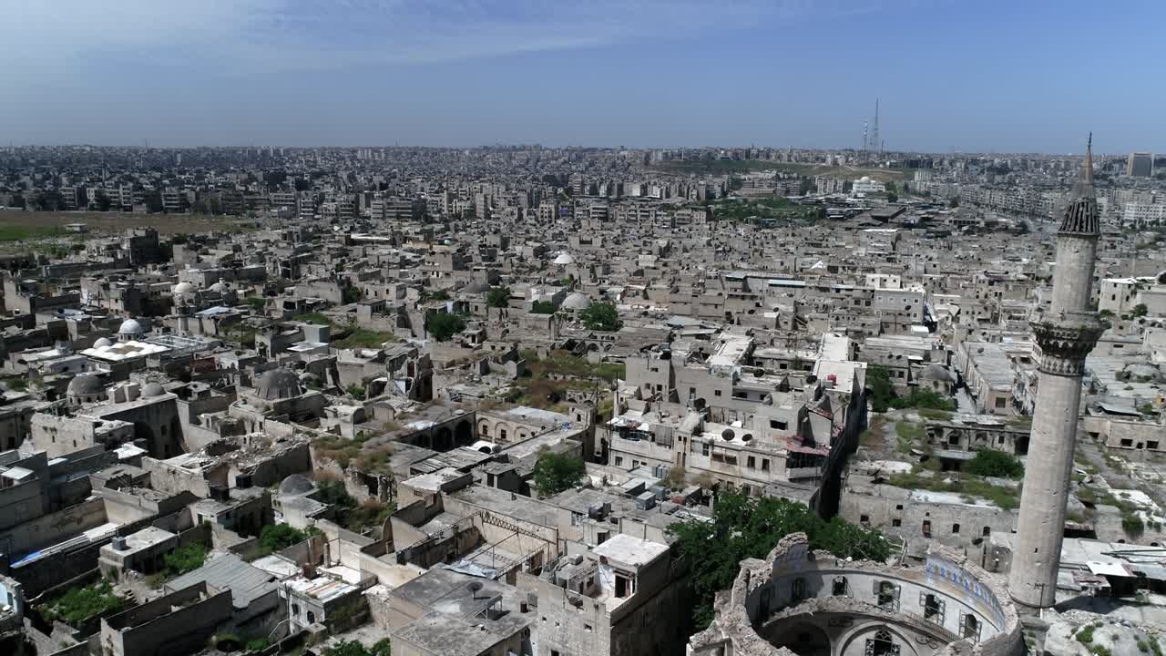 Aleppo in Syria under the sunlight. We can see the city all over the horizon 4K