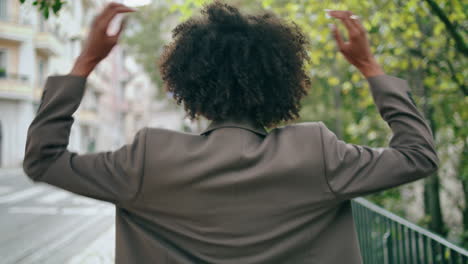 Carefree-business-woman-walking-city-street-close-up.-Lady-going-near-town-road.