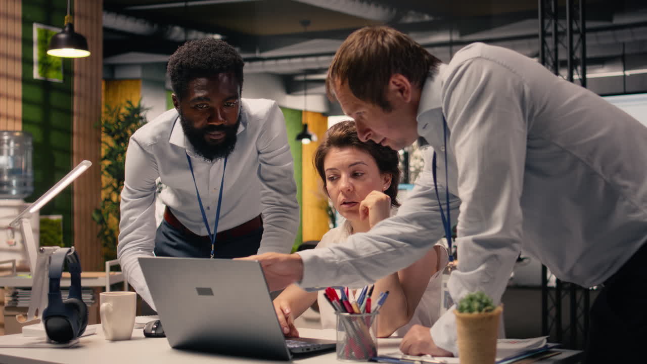 Multinational company work team collaborating on performance metrics