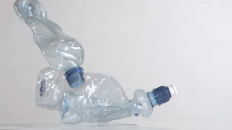 crushed bottles in super slow motion dropping