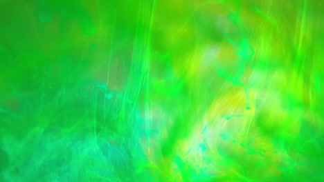 Water-bright-green-color-acrylic-ink-creating-otherworldly-effects,-beautiful-multi-colored-swirls-almost-look-like-northern-lights-forming