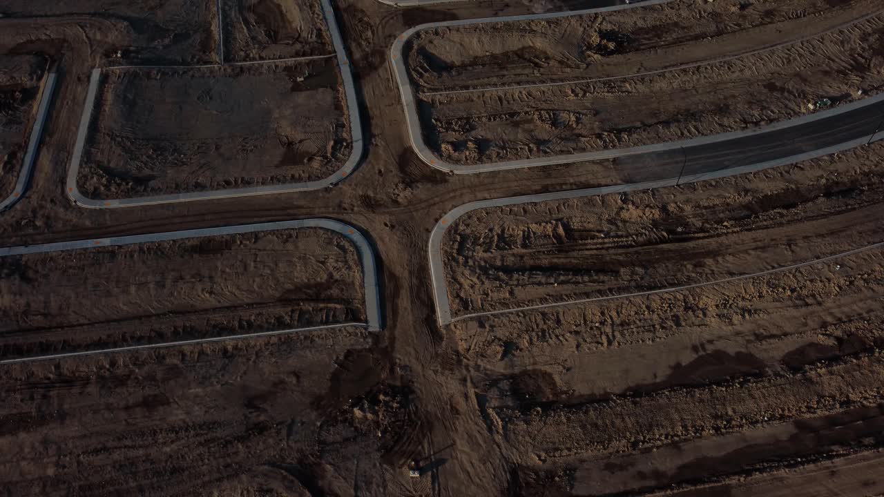 The roads of the under-construction community are covered in mud