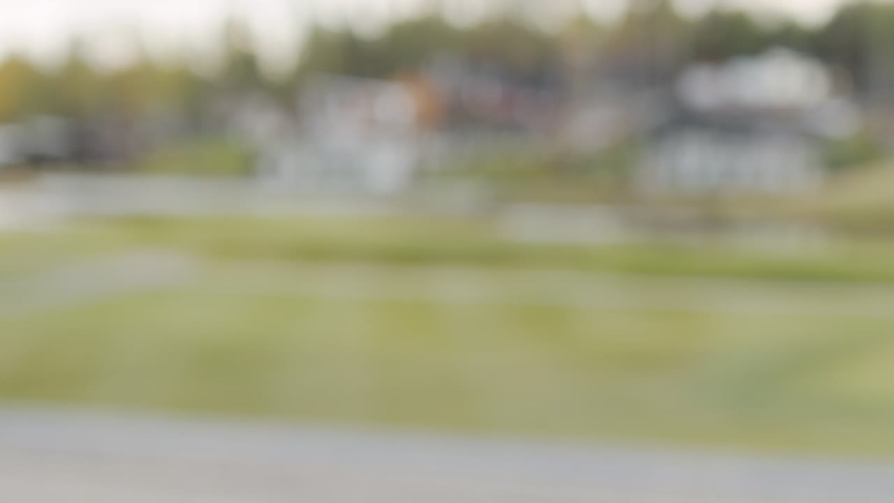 Handshake Of Two Contemporary Successful Business Partners Against Green Trees And Cloudy Sky After Negotiating And Making Deal