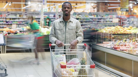man shopping at a supermarket