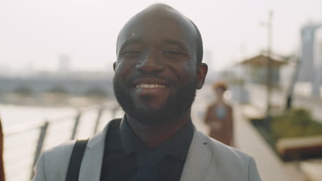 Portrait-of-Happy-African-American-Businessman-Outdoors