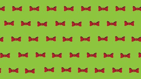Animation-of-bow-ties-floating-over-green-background