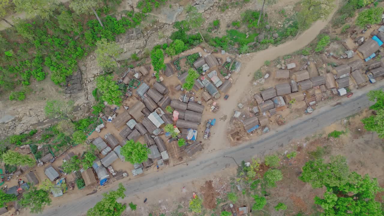 Hundreds have taken long-term shelter near the highway in Surkhet, Nepal, after a major flood washed away their homes, highlighting the prolonged impact of natural disasters on vulnerable communities.