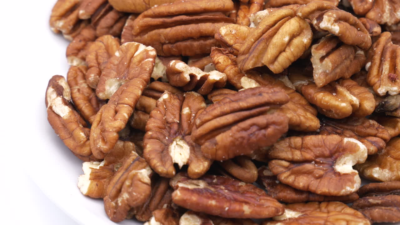 Pile of Pecan Nuts Rotating Close Up
