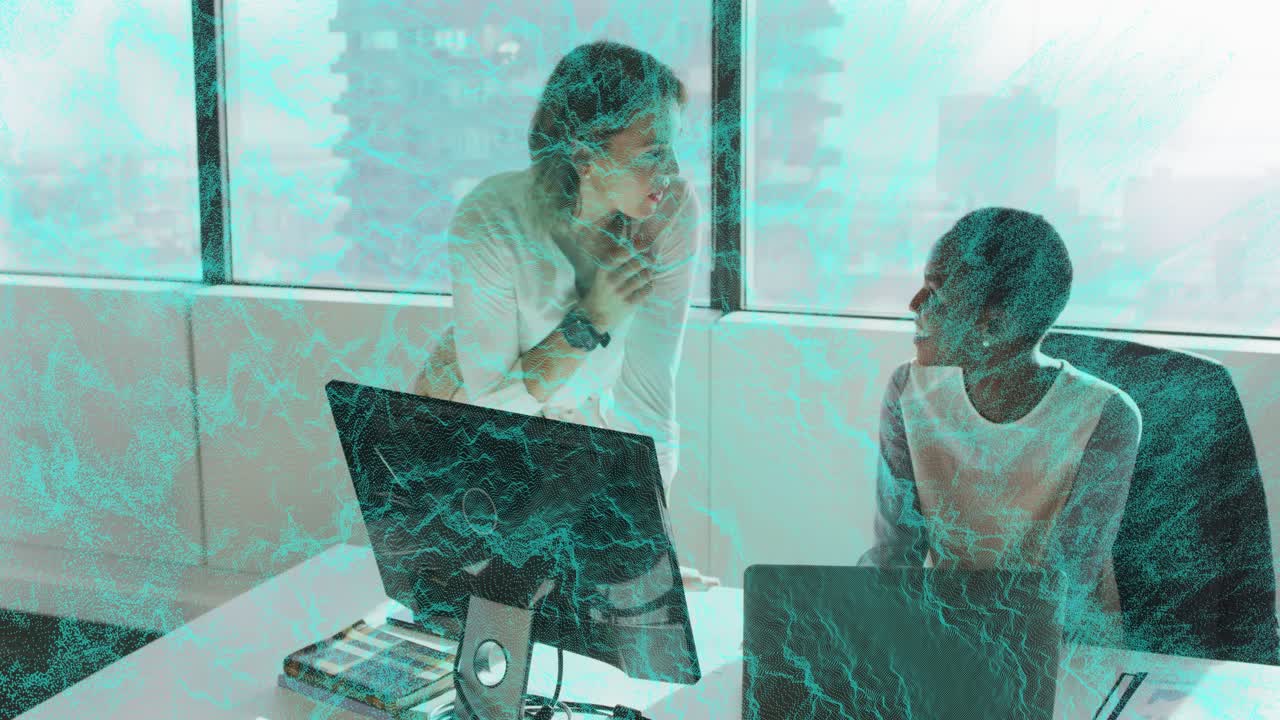 Businesswoman placing hand on screen and pointing at keyboard, guiding colleague reviewing project