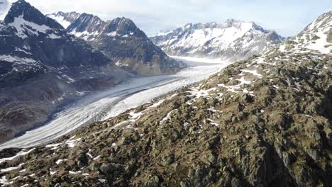 aerial flyover alongside the aletsch glacier in wallis, switzerland, which is the longest glacier of the swiss alps and europe