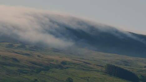 clouds being blown over mallerstang edge in the westmorelanddales by a strong east wind