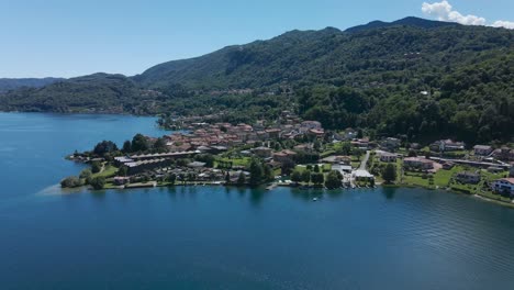 aerial shot over the picturesque town of pella, novara, piedmont, italy