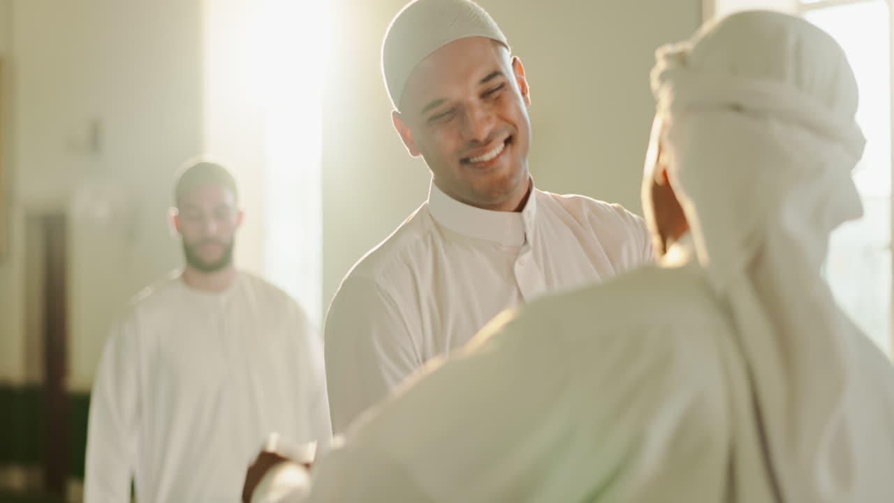 Muslim men embracing in a mosque