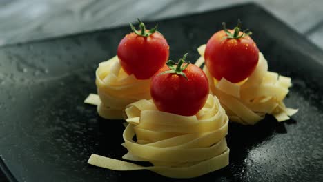 Spaghetti-rolled-in-balls-with-tomatoes