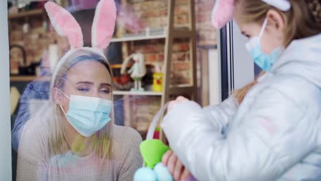 video of girl showing mother an easter eggs during quarantine