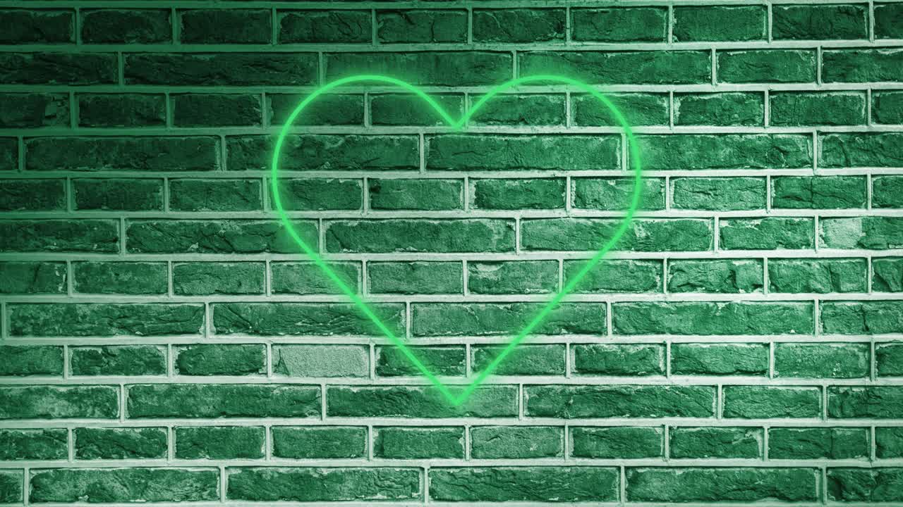 벽돌 벽에 빛나는 네온 심장 아이콘의 애니메이션