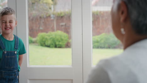 cute-little-boy-hugging-grandmother-smiling-embracing-her-grandson-happy-granny-enjoying-hug-from-her-grandchild-at-home-family-concept-4k