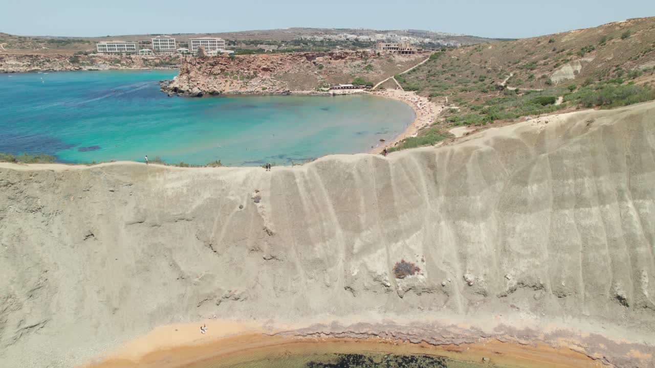 Unique Clay Cliffs at Qarraba Bay, Malta with Turquoise Mediterranean Sea views
