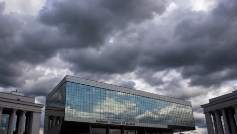 national library of belarus under a cloudy sky