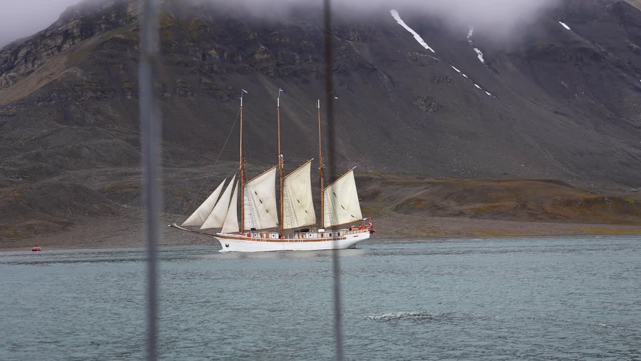 Vintage Ship With Sails Sailing in North Sea Water in Norwegian Fjord