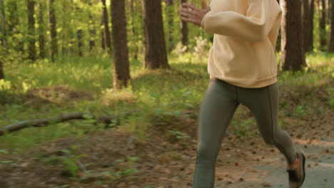 woman running in a forest