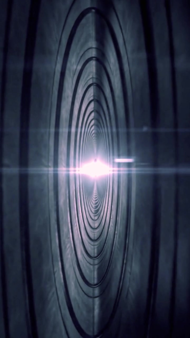 Traveling Through a Dark Futuristic Tunnel Towards a Bright Light