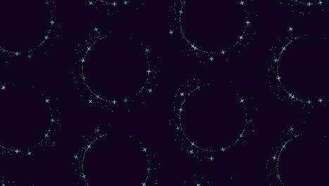 green stars in a circular pattern on a black background