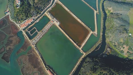 unhealthy water colour at an abandoned fish farm aerial view