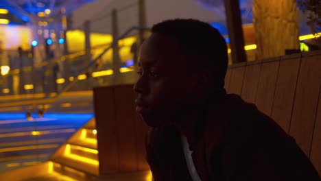 young sad african american thinking about his past life