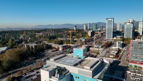 rooftop of surrey memorial hospital building in the city of surrey in canada - aerial pullback