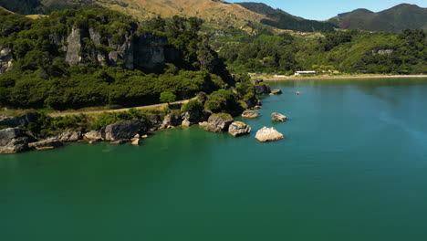 sensational aerial view of ligar bay beach on a calm peaceful day, new zealand