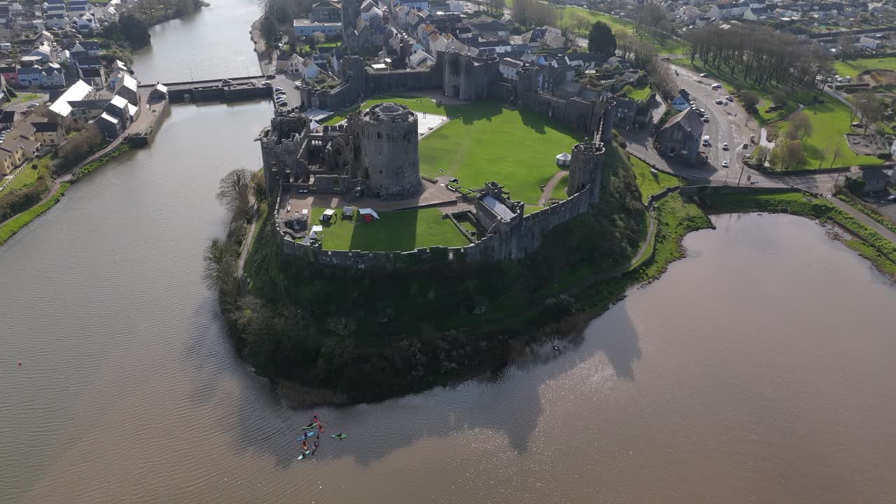 Orbit shot Pembroke Castle in the city of Wales, UK