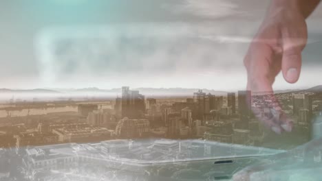 animation of man using tablet over cityscape