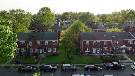 Drone-lateral-shot-of-housing-community-of-small-American-town