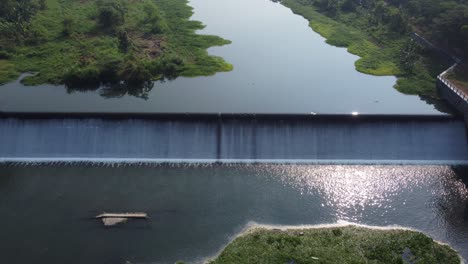 river landscape with dam and waterfall. aerial view