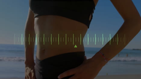 person standing on beach with audio waveform animation over their midsection