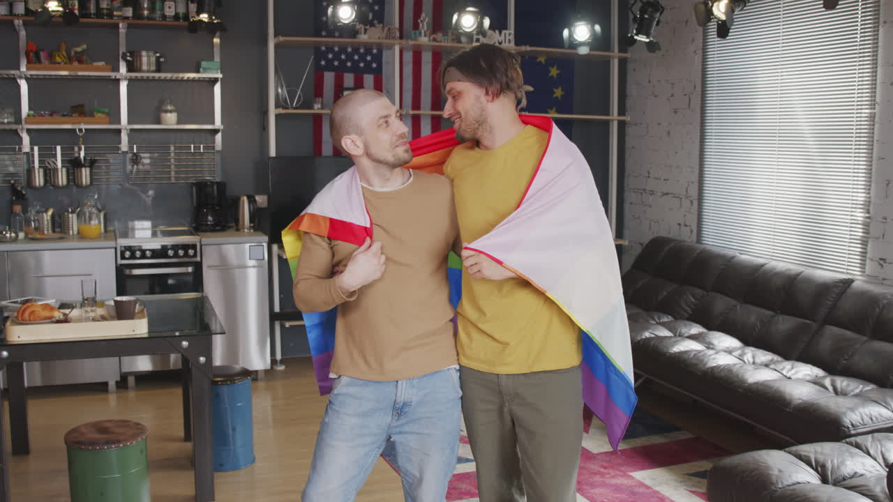 Homosexual Couple with Rainbow Flag
