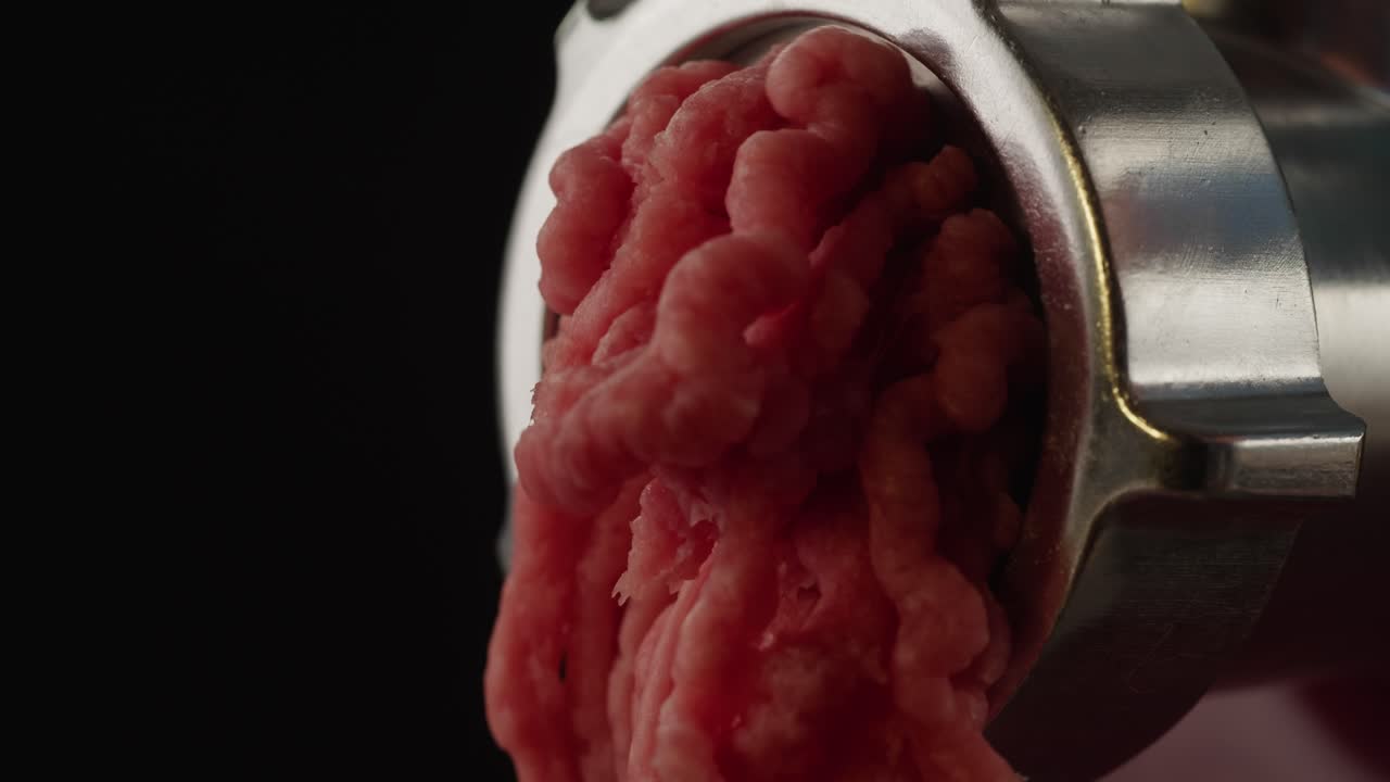 Ground Meat Coming Out of a Meat Grinder